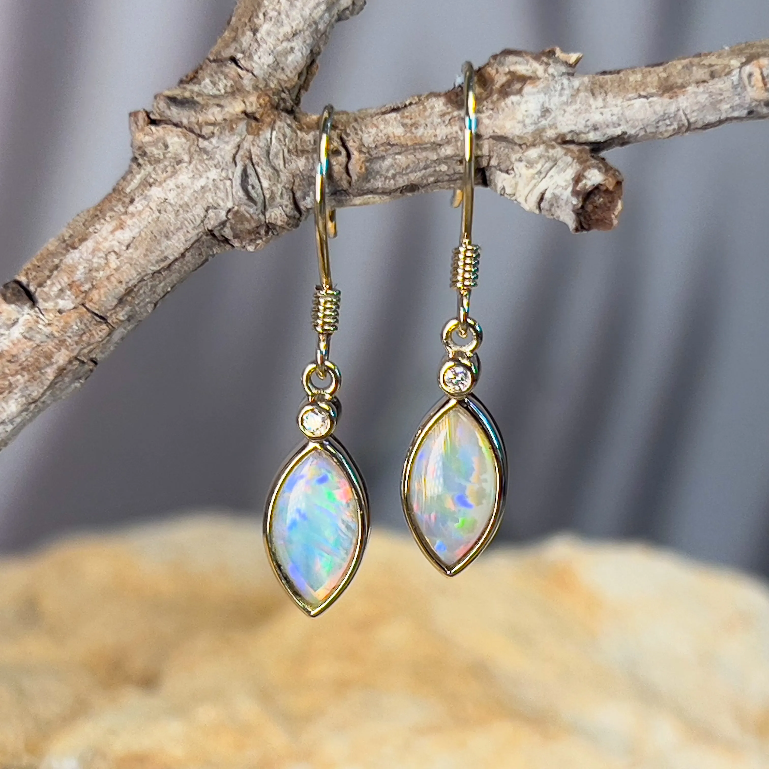 14kt Yellow Gold dangling Marquise shape Crystal Opal earrings