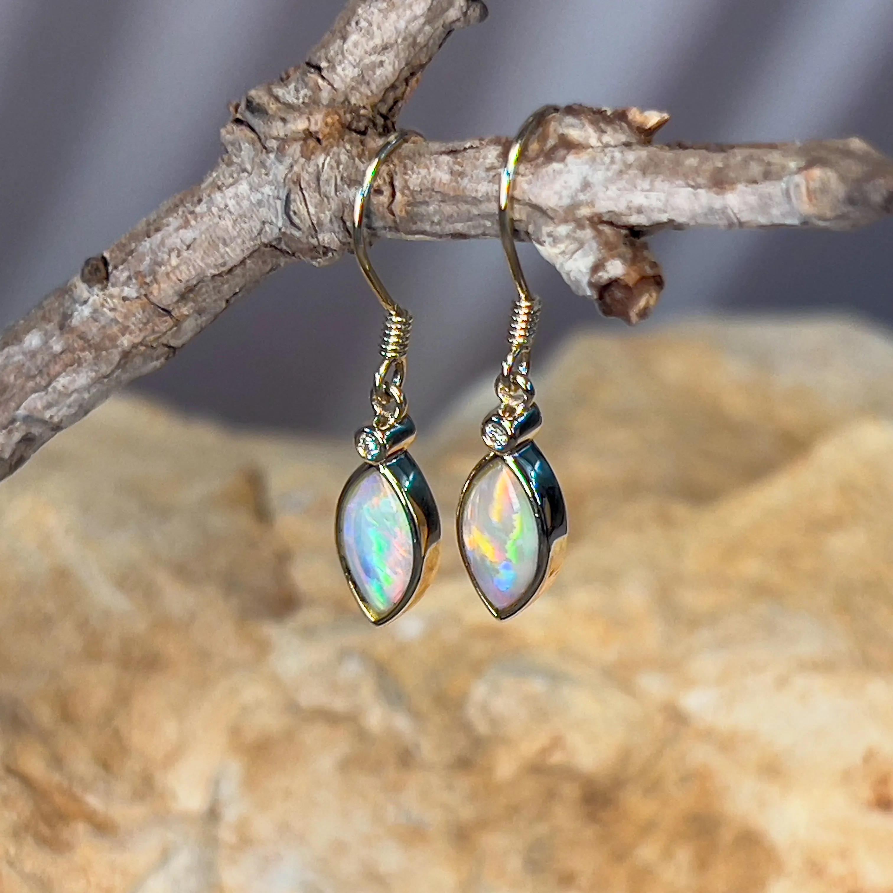 14kt Yellow Gold dangling Marquise shape Crystal Opal earrings