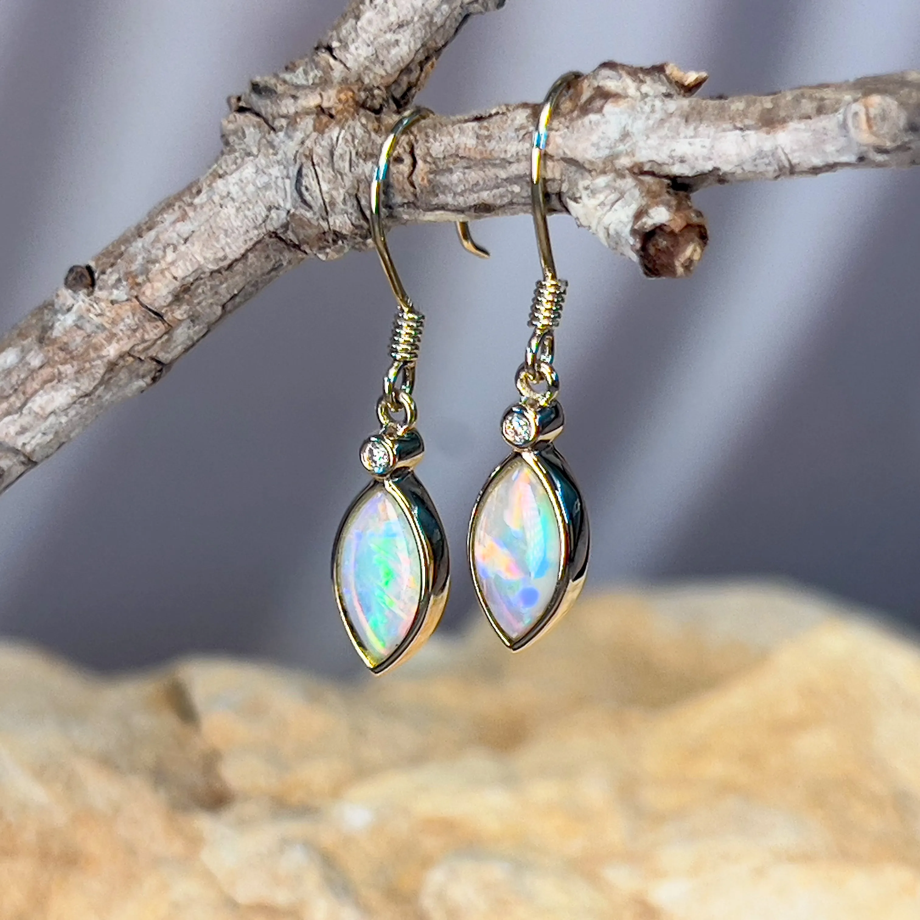 14kt Yellow Gold dangling Marquise shape Crystal Opal earrings