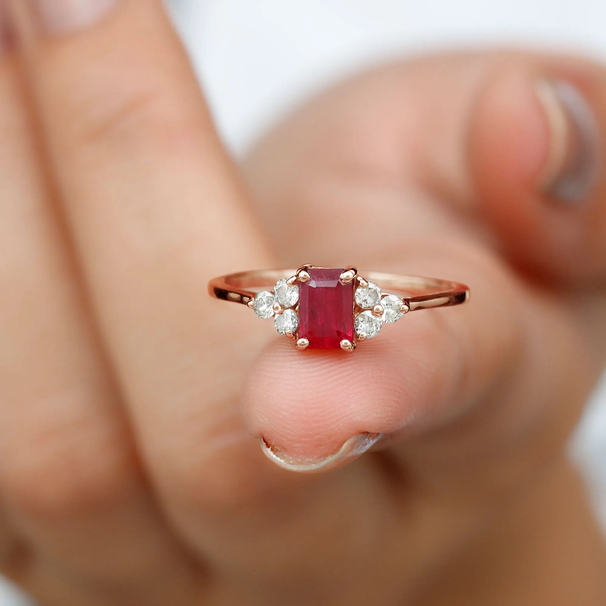 Emerald Cut Ruby Solitaire Ring with Diamond Trio