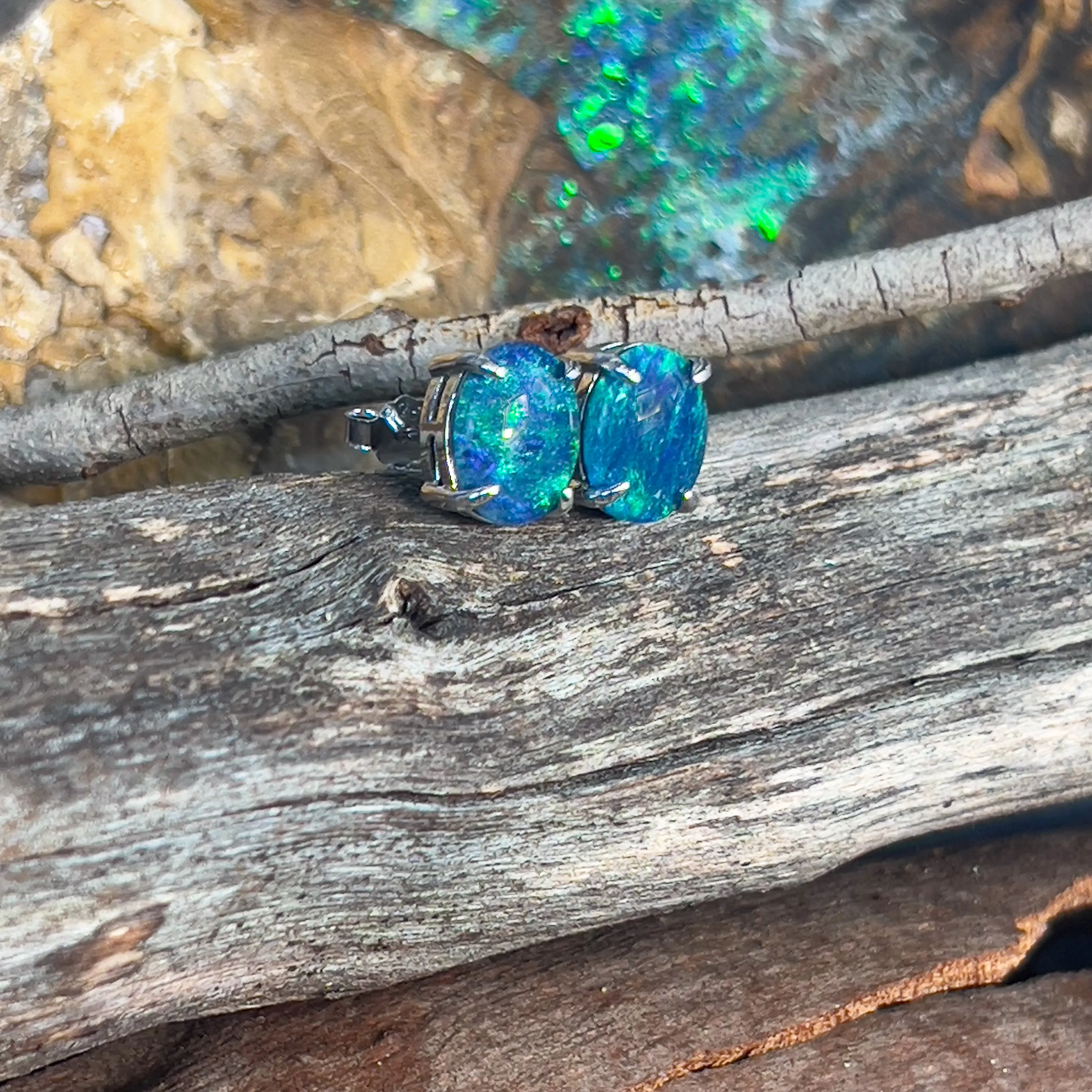 Pair of Sterling Silver 9x7mm Opal triplets claw set