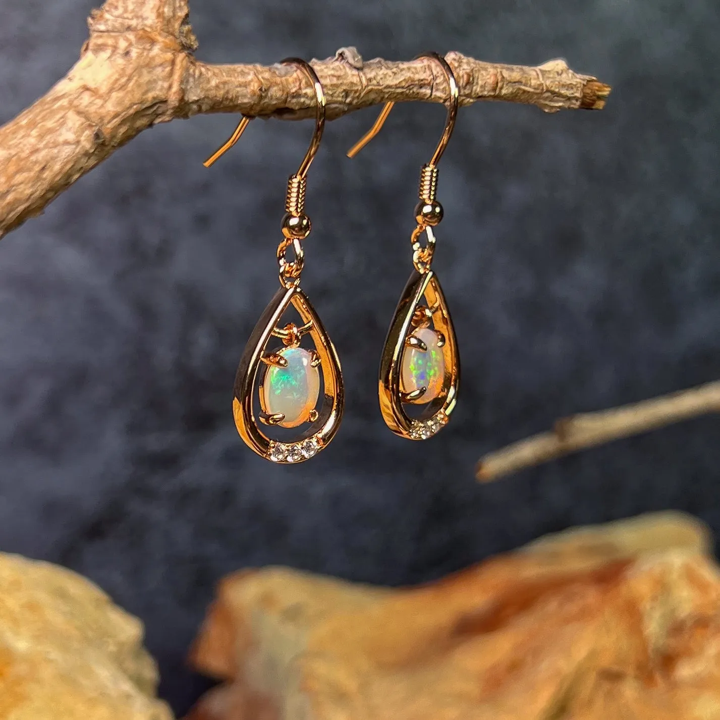 Rose Gold plated Sterling Silver dangling White Opal earrings with cz teardrop shape