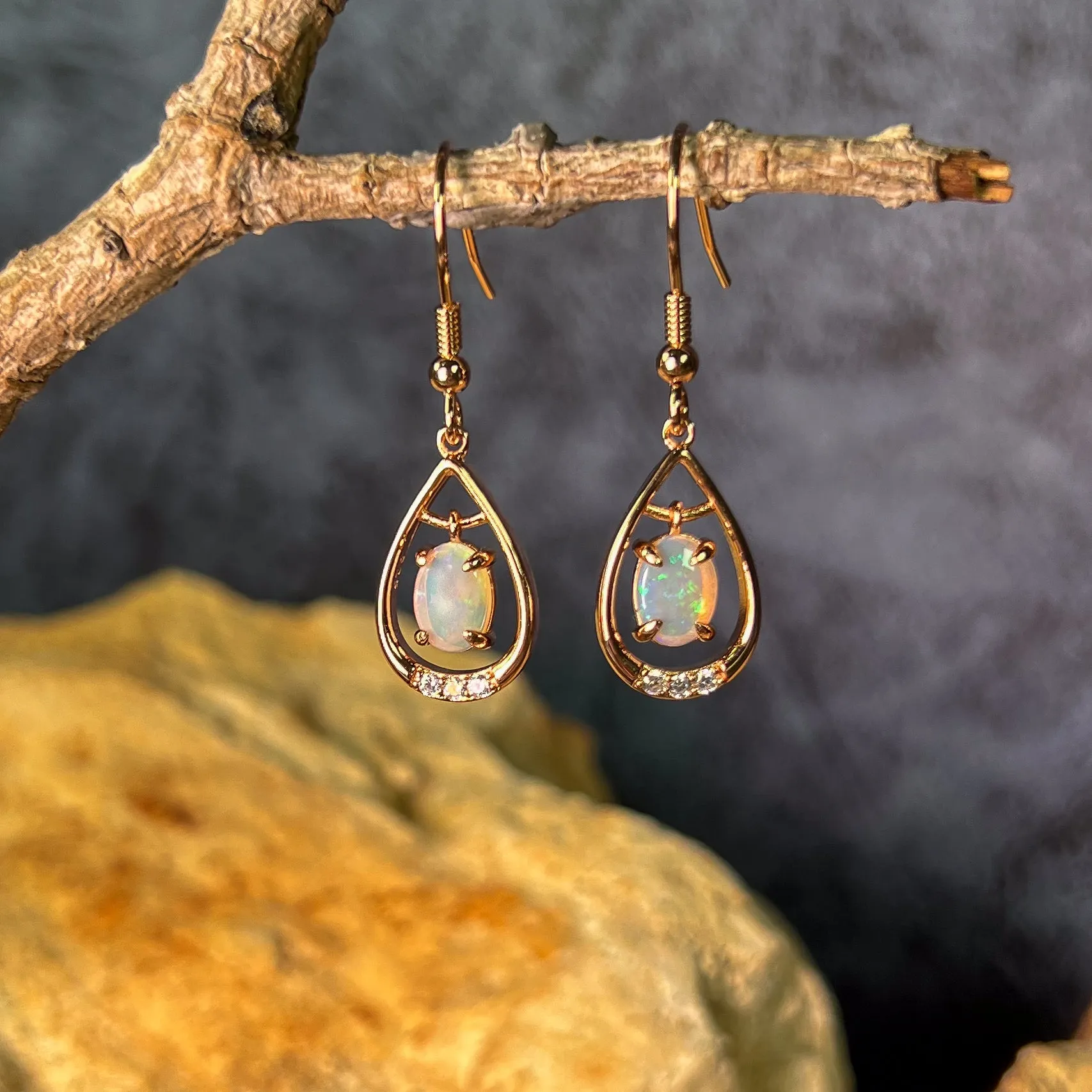 Rose Gold plated Sterling Silver dangling White Opal earrings with cz teardrop shape