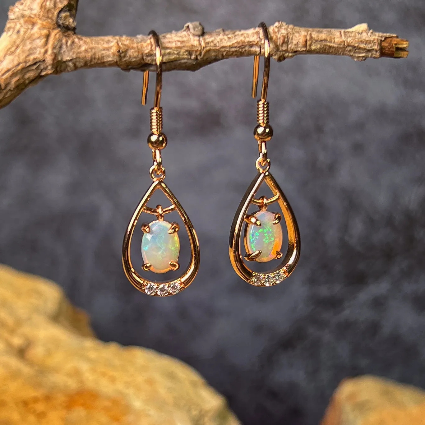 Rose Gold plated Sterling Silver dangling White Opal earrings with cz teardrop shape