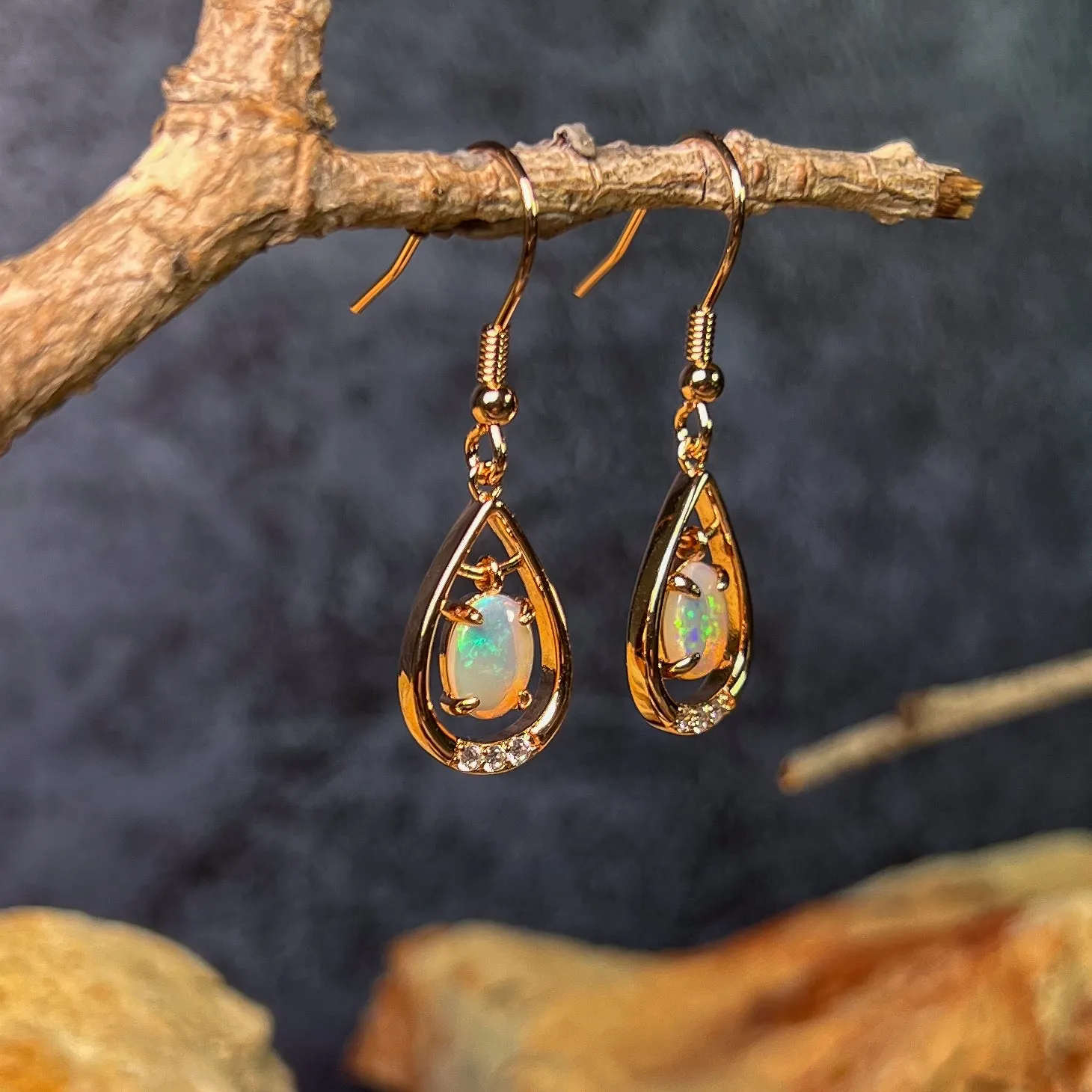 Rose Gold plated Sterling Silver dangling White Opal earrings with cz teardrop shape