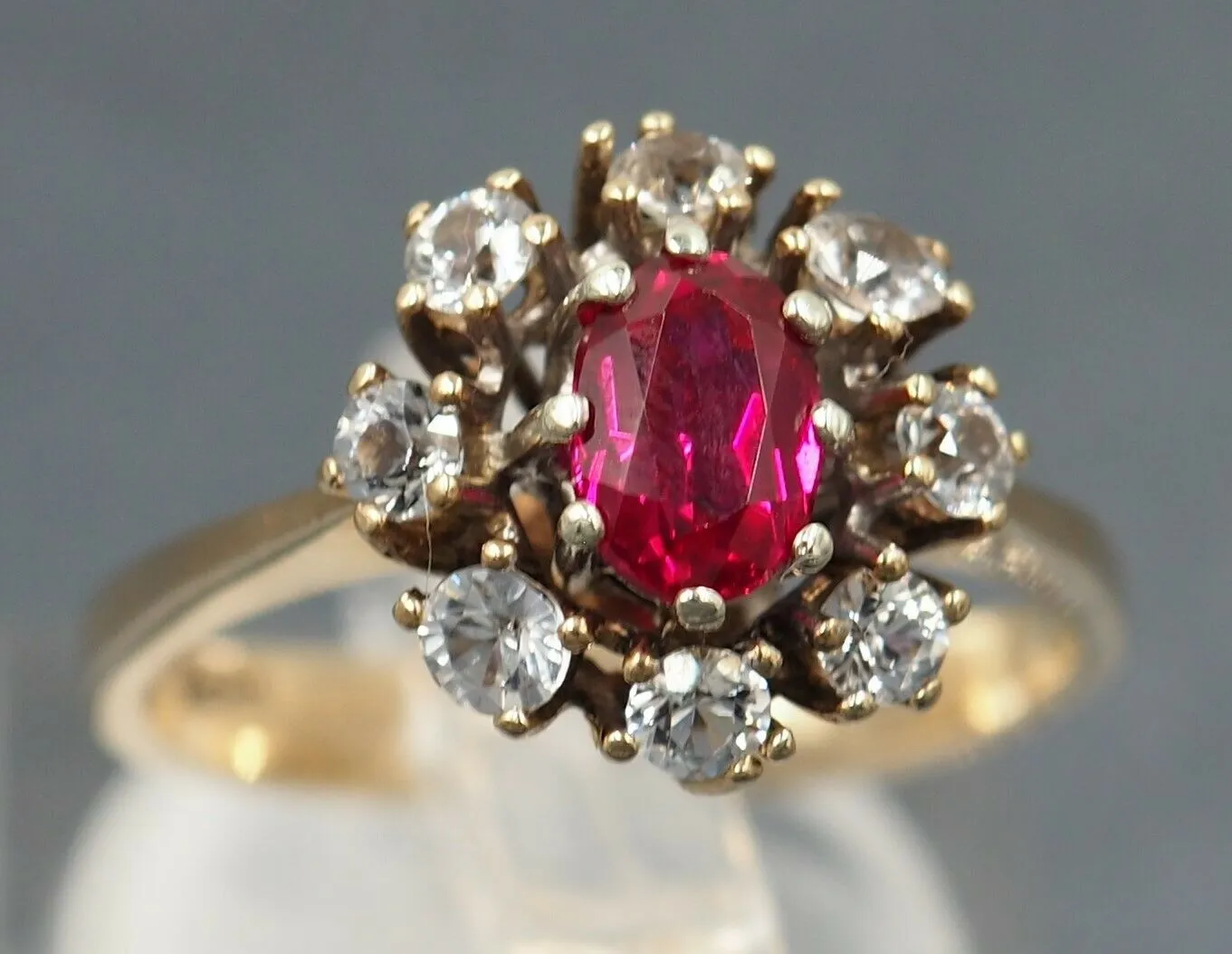 Ruby & Cubic Zirconia 9ct Yellow Gold Halo Ring