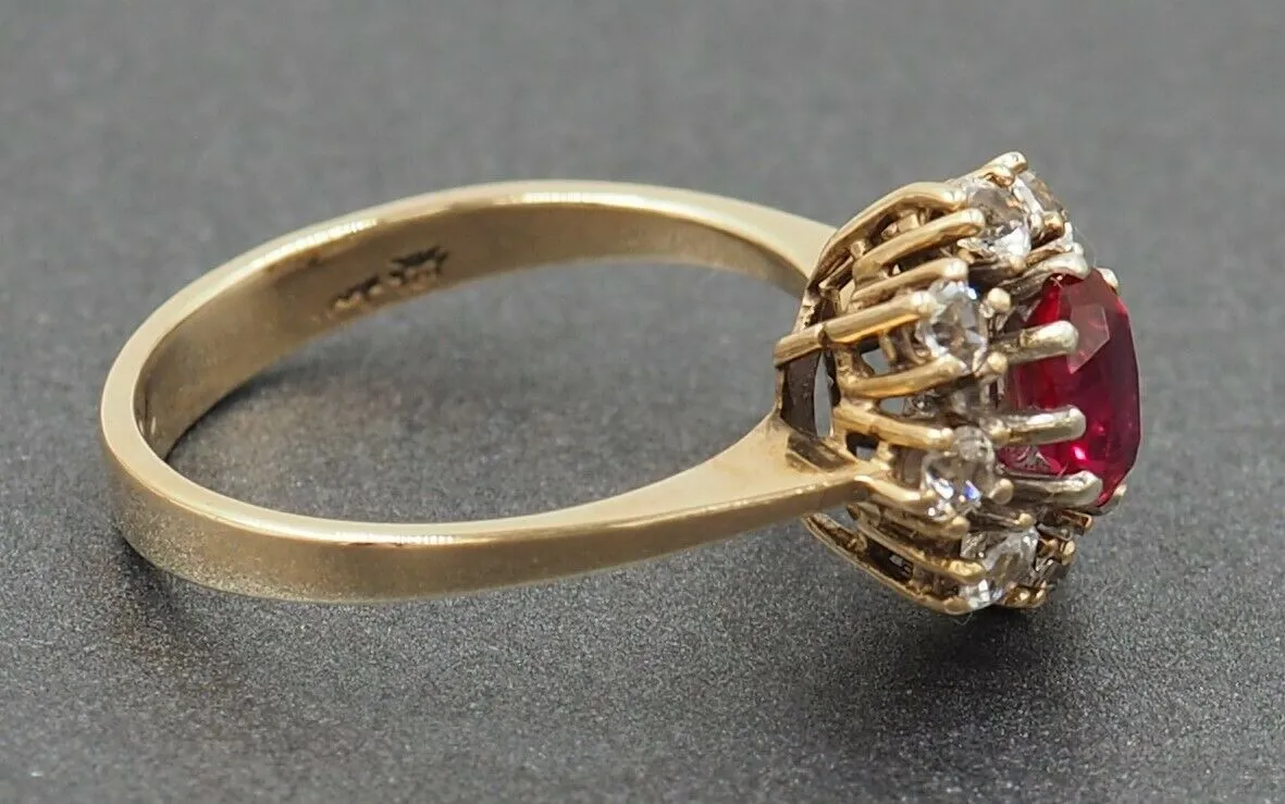 Ruby & Cubic Zirconia 9ct Yellow Gold Halo Ring