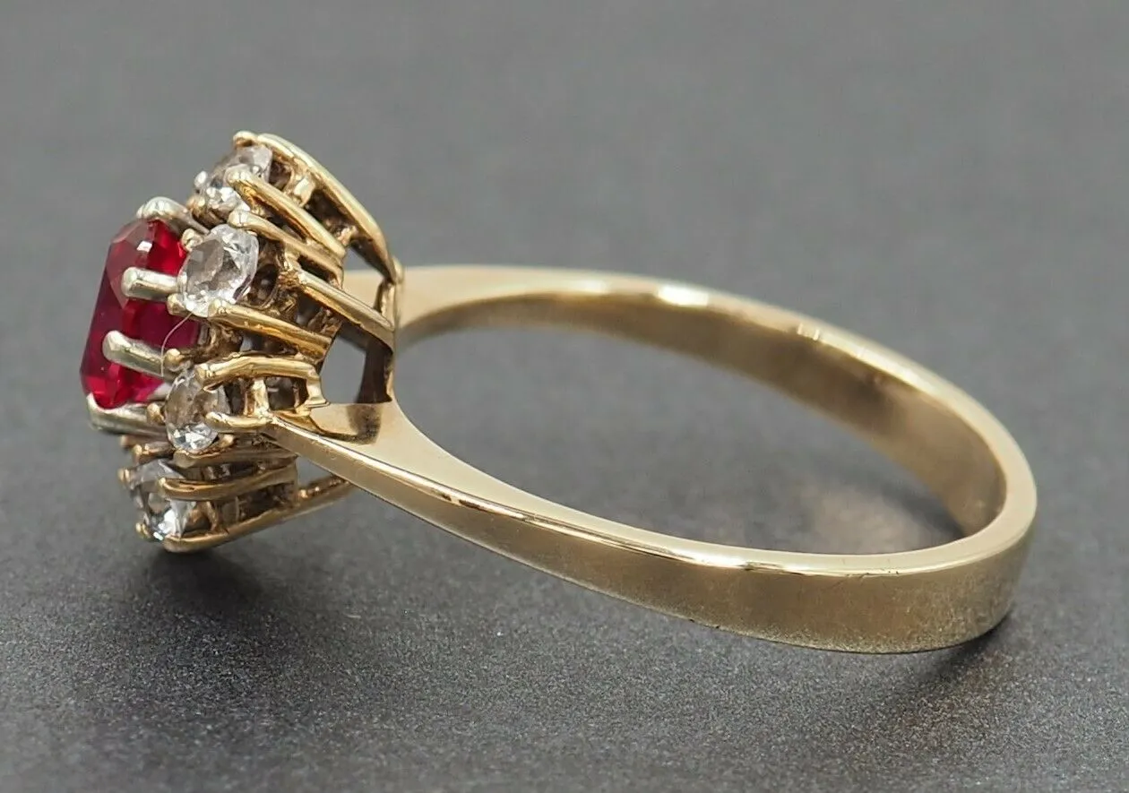 Ruby & Cubic Zirconia 9ct Yellow Gold Halo Ring