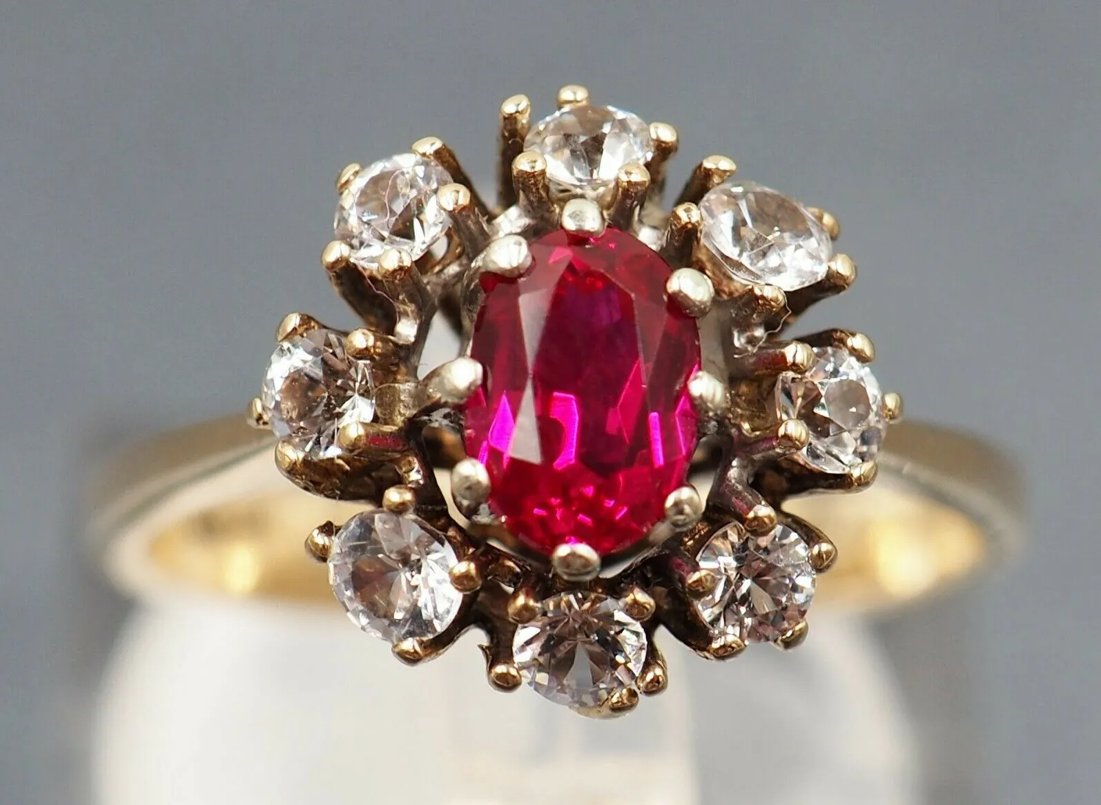 Ruby & Cubic Zirconia 9ct Yellow Gold Halo Ring