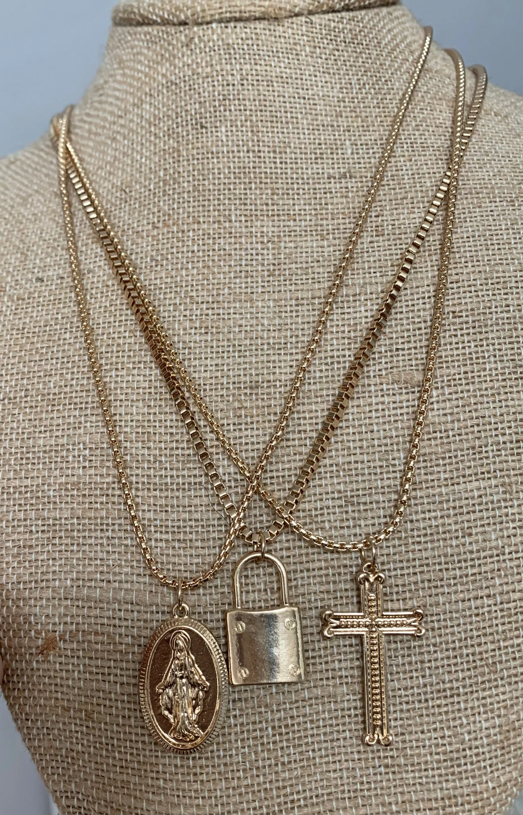 Three  Gold Faith necklaces